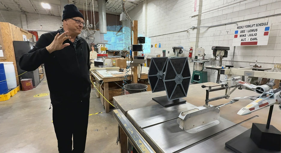 Dennis Muren inside ILM's original studio with TIE fighter and X-wing models.